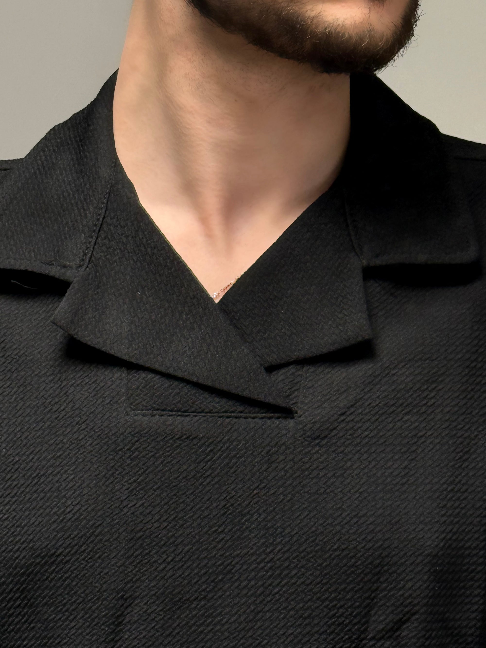 Polo manches courtes uni texturé